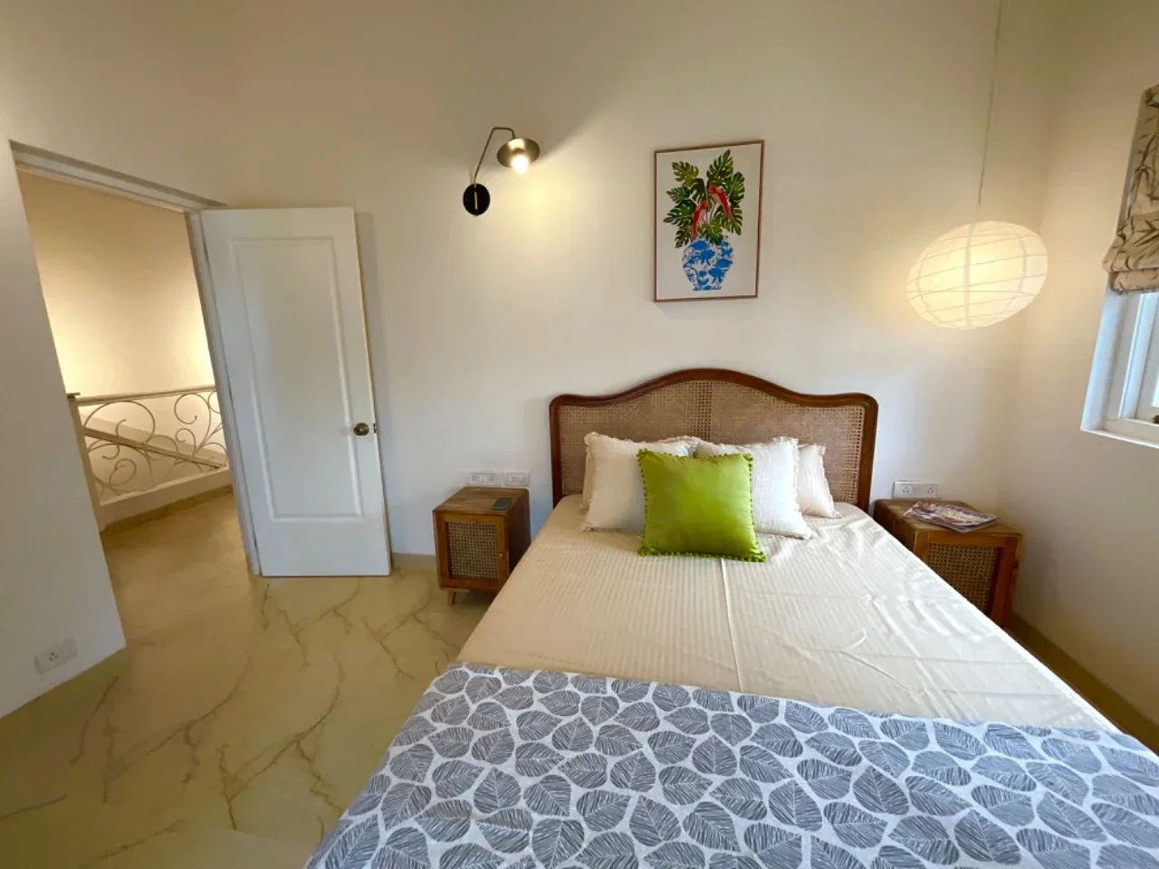 Second bedroom suite looking towards the doorway and upper staircase landing